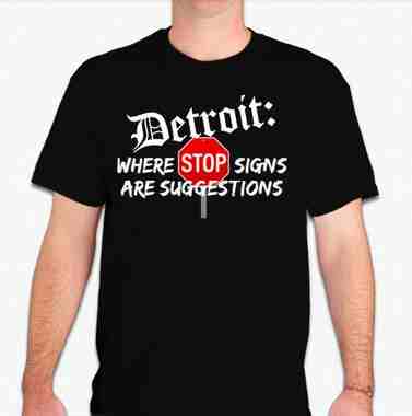 Front view of Veloreah Detroit Where Stop Signs Are Suggestions black graphic T-shirt