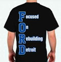 Back view of Veloreah Focused On Rebuilding Detroit black graphic T-shirt
